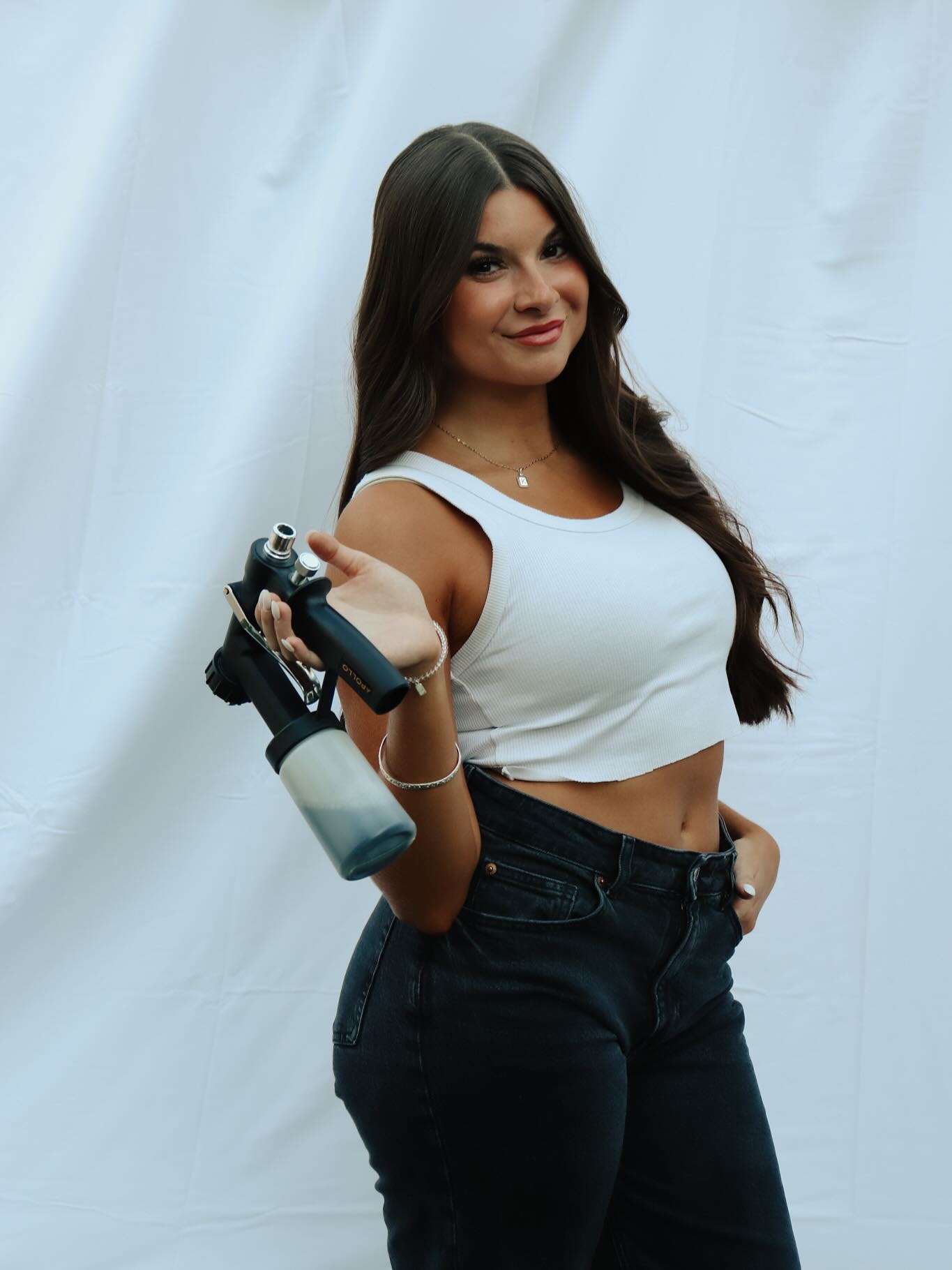 Erica, owner and artist of TansByErica